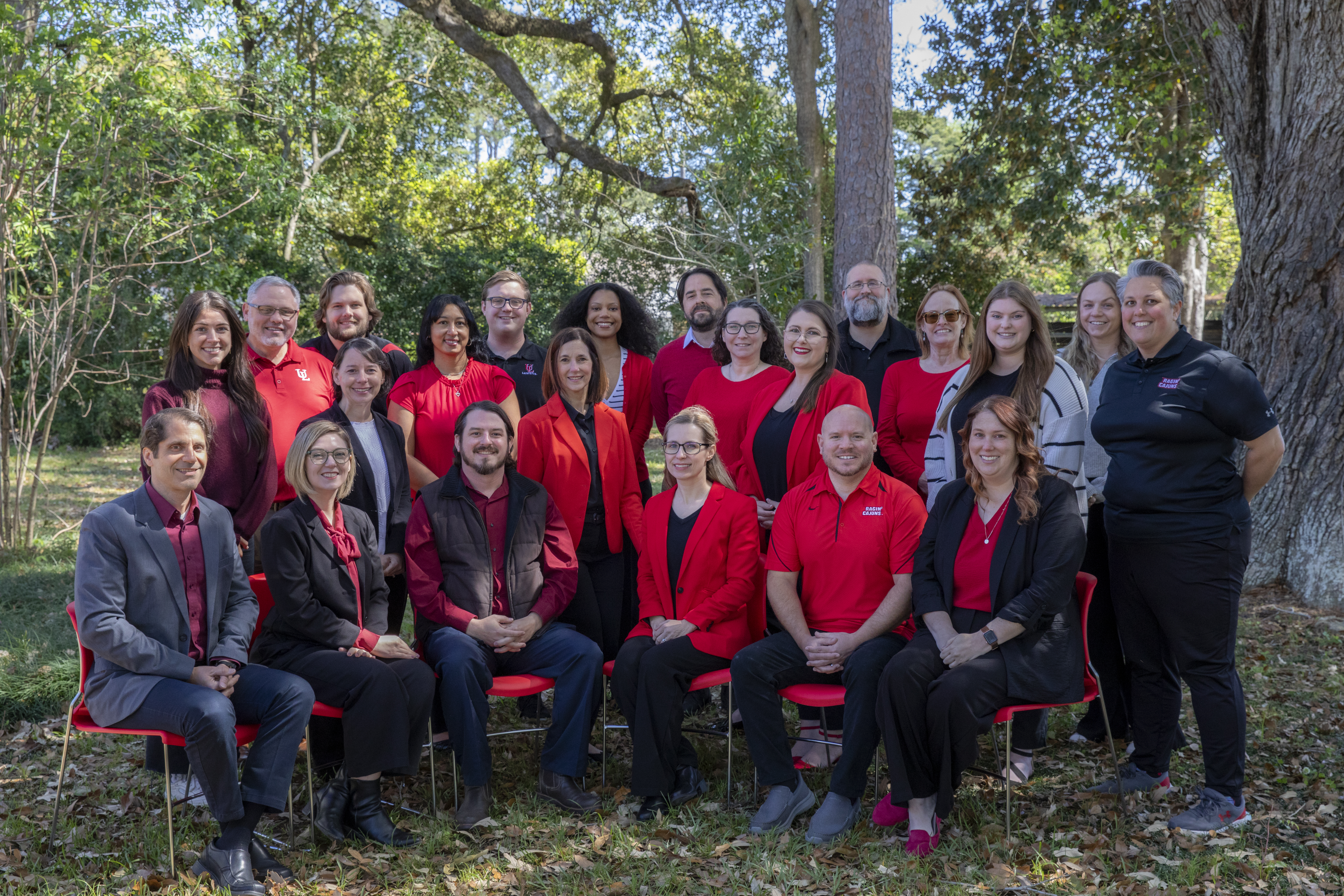 Group photo of the Office of Distance Learning staff taken outdoors.